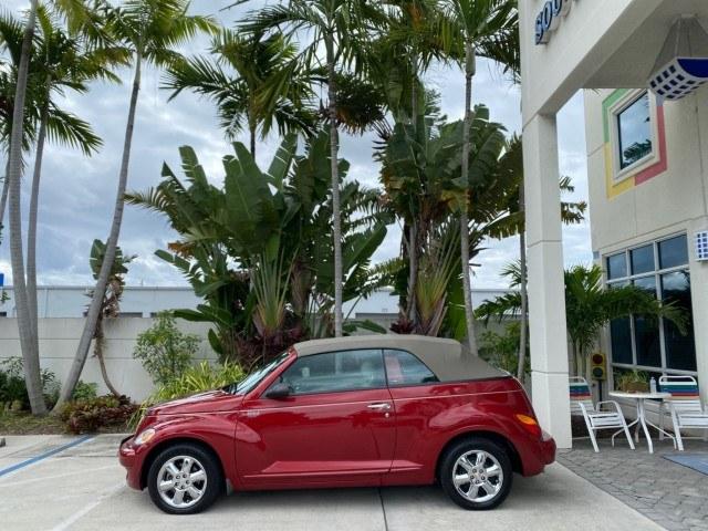 2005 Inferno Red Crystal Pearl /Taupe/Pearl Beige Chrysler PT Cruiser Touring CONV LOW MILES 34,462 (3C3AY55E85T) with an 2.4L DOHC SMPI 16-Valve I4 Engine engine, Automatic transmission, located at 4701 North Dixie Hwy, Pompano Beach, FL, 33064, (954) 422-2889, 26.240938, -80.123474 - OUR WEBPAGE FLORIDACARS1.COM HAS OVER 100 PHOTOS AND FREE CARFAX LINK 2005 Chrysler PT Cruiser Touring Convertible 2.4L I4 F DOHC 16V Gasoline 29 MPG Front Wheel Drive Features ABS Brakes Air Conditioning Alloy Wheels AM/FM Stereo Automatic Transmission Cassette Player CD Audio Cruise Control Leathe- Photo#4