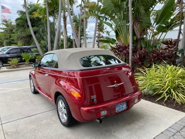 2005 Inferno Red Crystal Pearl /Taupe/Pearl Beige Chrysler PT Cruiser Touring CONV LOW MILES 34,462 (3C3AY55E85T) with an 2.4L DOHC SMPI 16-Valve I4 Engine engine, Automatic transmission, located at 4701 North Dixie Hwy, Pompano Beach, FL, 33064, (954) 422-2889, 26.240938, -80.123474 - OUR WEBPAGE FLORIDACARS1.COM HAS OVER 100 PHOTOS AND FREE CARFAX LINK 2005 Chrysler PT Cruiser Touring Convertible 2.4L I4 F DOHC 16V Gasoline 29 MPG Front Wheel Drive Features ABS Brakes Air Conditioning Alloy Wheels AM/FM Stereo Automatic Transmission Cassette Player CD Audio Cruise Control Leathe- Photo#5