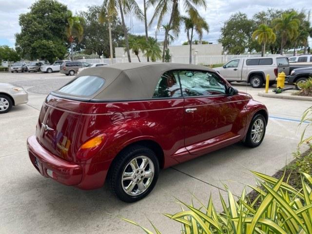 2005 Inferno Red Crystal Pearl /Taupe/Pearl Beige Chrysler PT Cruiser Touring CONV LOW MILES 34,462 (3C3AY55E85T) with an 2.4L DOHC SMPI 16-Valve I4 Engine engine, Automatic transmission, located at 4701 North Dixie Hwy, Pompano Beach, FL, 33064, (954) 422-2889, 26.240938, -80.123474 - OUR WEBPAGE FLORIDACARS1.COM HAS OVER 100 PHOTOS AND FREE CARFAX LINK 2005 Chrysler PT Cruiser Touring Convertible 2.4L I4 F DOHC 16V Gasoline 29 MPG Front Wheel Drive Features ABS Brakes Air Conditioning Alloy Wheels AM/FM Stereo Automatic Transmission Cassette Player CD Audio Cruise Control Leathe- Photo#7