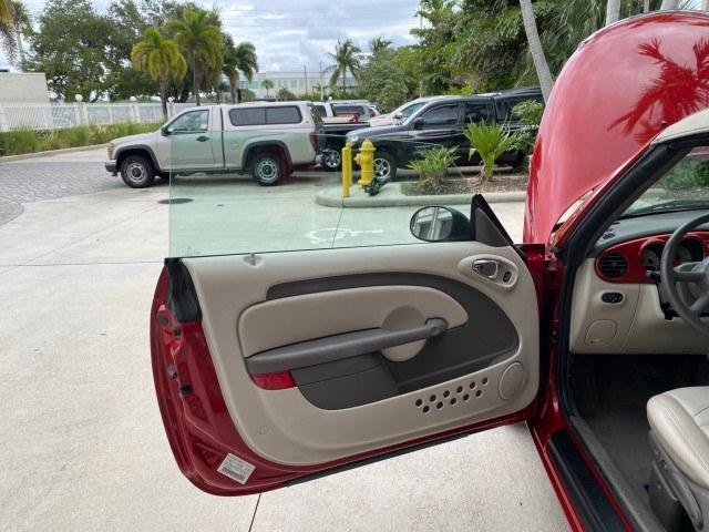 2005 Inferno Red Crystal Pearl /Taupe/Pearl Beige Chrysler PT Cruiser Touring CONV LOW MILES 34,462 (3C3AY55E85T) with an 2.4L DOHC SMPI 16-Valve I4 Engine engine, Automatic transmission, located at 4701 North Dixie Hwy, Pompano Beach, FL, 33064, (954) 422-2889, 26.240938, -80.123474 - OUR WEBPAGE FLORIDACARS1.COM HAS OVER 100 PHOTOS AND FREE CARFAX LINK 2005 Chrysler PT Cruiser Touring Convertible 2.4L I4 F DOHC 16V Gasoline 29 MPG Front Wheel Drive Features ABS Brakes Air Conditioning Alloy Wheels AM/FM Stereo Automatic Transmission Cassette Player CD Audio Cruise Control Leathe- Photo#9