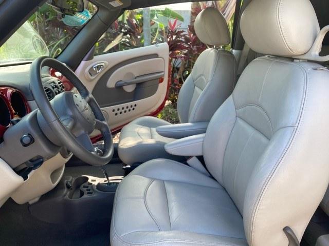2005 Inferno Red Crystal Pearl /Taupe/Pearl Beige Chrysler PT Cruiser Touring CONV LOW MILES 34,462 (3C3AY55E85T) with an 2.4L DOHC SMPI 16-Valve I4 Engine engine, Automatic transmission, located at 4701 North Dixie Hwy, Pompano Beach, FL, 33064, (954) 422-2889, 26.240938, -80.123474 - OUR WEBPAGE FLORIDACARS1.COM HAS OVER 100 PHOTOS AND FREE CARFAX LINK 2005 Chrysler PT Cruiser Touring Convertible 2.4L I4 F DOHC 16V Gasoline 29 MPG Front Wheel Drive Features ABS Brakes Air Conditioning Alloy Wheels AM/FM Stereo Automatic Transmission Cassette Player CD Audio Cruise Control Leathe- Photo#10