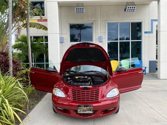 2005 Inferno Red Crystal Pearl /Taupe/Pearl Beige Chrysler PT Cruiser Touring CONV LOW MILES 34,462 (3C3AY55E85T) with an 2.4L DOHC SMPI 16-Valve I4 Engine engine, Automatic transmission, located at 4701 North Dixie Hwy, Pompano Beach, FL, 33064, (954) 422-2889, 26.240938, -80.123474 - OUR WEBPAGE FLORIDACARS1.COM HAS OVER 100 PHOTOS AND FREE CARFAX LINK 2005 Chrysler PT Cruiser Touring Convertible 2.4L I4 F DOHC 16V Gasoline 29 MPG Front Wheel Drive Features ABS Brakes Air Conditioning Alloy Wheels AM/FM Stereo Automatic Transmission Cassette Player CD Audio Cruise Control Leathe- Photo#16