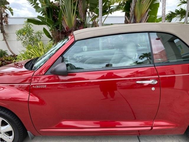 2005 Inferno Red Crystal Pearl /Taupe/Pearl Beige Chrysler PT Cruiser Touring CONV LOW MILES 34,462 (3C3AY55E85T) with an 2.4L DOHC SMPI 16-Valve I4 Engine engine, Automatic transmission, located at 4701 North Dixie Hwy, Pompano Beach, FL, 33064, (954) 422-2889, 26.240938, -80.123474 - OUR WEBPAGE FLORIDACARS1.COM HAS OVER 100 PHOTOS AND FREE CARFAX LINK 2005 Chrysler PT Cruiser Touring Convertible 2.4L I4 F DOHC 16V Gasoline 29 MPG Front Wheel Drive Features ABS Brakes Air Conditioning Alloy Wheels AM/FM Stereo Automatic Transmission Cassette Player CD Audio Cruise Control Leathe- Photo#27
