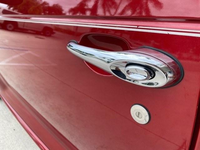 2005 Inferno Red Crystal Pearl /Taupe/Pearl Beige Chrysler PT Cruiser Touring CONV LOW MILES 34,462 (3C3AY55E85T) with an 2.4L DOHC SMPI 16-Valve I4 Engine engine, Automatic transmission, located at 4701 North Dixie Hwy, Pompano Beach, FL, 33064, (954) 422-2889, 26.240938, -80.123474 - OUR WEBPAGE FLORIDACARS1.COM HAS OVER 100 PHOTOS AND FREE CARFAX LINK 2005 Chrysler PT Cruiser Touring Convertible 2.4L I4 F DOHC 16V Gasoline 29 MPG Front Wheel Drive Features ABS Brakes Air Conditioning Alloy Wheels AM/FM Stereo Automatic Transmission Cassette Player CD Audio Cruise Control Leathe- Photo#28