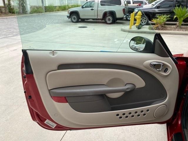 2005 Inferno Red Crystal Pearl /Taupe/Pearl Beige Chrysler PT Cruiser Touring CONV LOW MILES 34,462 (3C3AY55E85T) with an 2.4L DOHC SMPI 16-Valve I4 Engine engine, Automatic transmission, located at 4701 North Dixie Hwy, Pompano Beach, FL, 33064, (954) 422-2889, 26.240938, -80.123474 - OUR WEBPAGE FLORIDACARS1.COM HAS OVER 100 PHOTOS AND FREE CARFAX LINK 2005 Chrysler PT Cruiser Touring Convertible 2.4L I4 F DOHC 16V Gasoline 29 MPG Front Wheel Drive Features ABS Brakes Air Conditioning Alloy Wheels AM/FM Stereo Automatic Transmission Cassette Player CD Audio Cruise Control Leathe- Photo#32