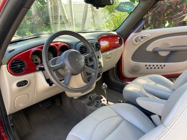 2005 Inferno Red Crystal Pearl /Taupe/Pearl Beige Chrysler PT Cruiser Touring CONV LOW MILES 34,462 (3C3AY55E85T) with an 2.4L DOHC SMPI 16-Valve I4 Engine engine, Automatic transmission, located at 4701 North Dixie Hwy, Pompano Beach, FL, 33064, (954) 422-2889, 26.240938, -80.123474 - OUR WEBPAGE FLORIDACARS1.COM HAS OVER 100 PHOTOS AND FREE CARFAX LINK 2005 Chrysler PT Cruiser Touring Convertible 2.4L I4 F DOHC 16V Gasoline 29 MPG Front Wheel Drive Features ABS Brakes Air Conditioning Alloy Wheels AM/FM Stereo Automatic Transmission Cassette Player CD Audio Cruise Control Leathe- Photo#34