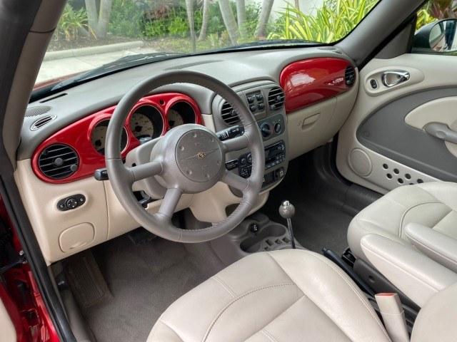 2005 Inferno Red Crystal Pearl /Taupe/Pearl Beige Chrysler PT Cruiser Touring CONV LOW MILES 34,462 (3C3AY55E85T) with an 2.4L DOHC SMPI 16-Valve I4 Engine engine, Automatic transmission, located at 4701 North Dixie Hwy, Pompano Beach, FL, 33064, (954) 422-2889, 26.240938, -80.123474 - OUR WEBPAGE FLORIDACARS1.COM HAS OVER 100 PHOTOS AND FREE CARFAX LINK 2005 Chrysler PT Cruiser Touring Convertible 2.4L I4 F DOHC 16V Gasoline 29 MPG Front Wheel Drive Features ABS Brakes Air Conditioning Alloy Wheels AM/FM Stereo Automatic Transmission Cassette Player CD Audio Cruise Control Leathe- Photo#35
