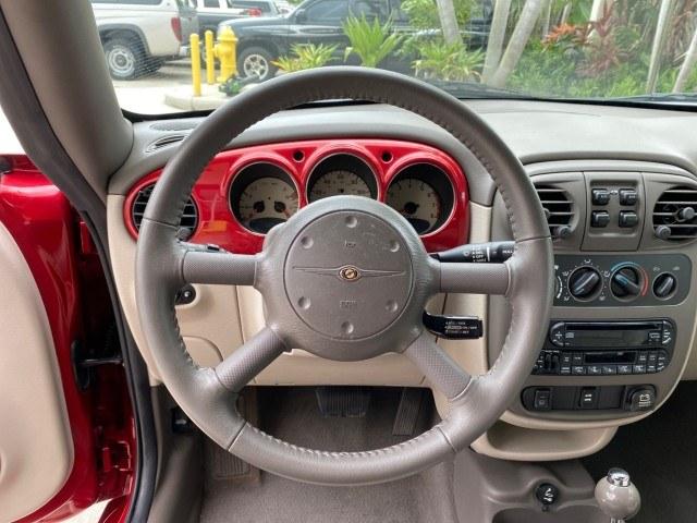 2005 Inferno Red Crystal Pearl /Taupe/Pearl Beige Chrysler PT Cruiser Touring CONV LOW MILES 34,462 (3C3AY55E85T) with an 2.4L DOHC SMPI 16-Valve I4 Engine engine, Automatic transmission, located at 4701 North Dixie Hwy, Pompano Beach, FL, 33064, (954) 422-2889, 26.240938, -80.123474 - OUR WEBPAGE FLORIDACARS1.COM HAS OVER 100 PHOTOS AND FREE CARFAX LINK 2005 Chrysler PT Cruiser Touring Convertible 2.4L I4 F DOHC 16V Gasoline 29 MPG Front Wheel Drive Features ABS Brakes Air Conditioning Alloy Wheels AM/FM Stereo Automatic Transmission Cassette Player CD Audio Cruise Control Leathe- Photo#36