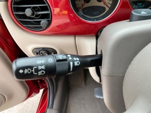 2005 Inferno Red Crystal Pearl /Taupe/Pearl Beige Chrysler PT Cruiser Touring CONV LOW MILES 34,462 (3C3AY55E85T) with an 2.4L DOHC SMPI 16-Valve I4 Engine engine, Automatic transmission, located at 4701 North Dixie Hwy, Pompano Beach, FL, 33064, (954) 422-2889, 26.240938, -80.123474 - OUR WEBPAGE FLORIDACARS1.COM HAS OVER 100 PHOTOS AND FREE CARFAX LINK 2005 Chrysler PT Cruiser Touring Convertible 2.4L I4 F DOHC 16V Gasoline 29 MPG Front Wheel Drive Features ABS Brakes Air Conditioning Alloy Wheels AM/FM Stereo Automatic Transmission Cassette Player CD Audio Cruise Control Leathe- Photo#39