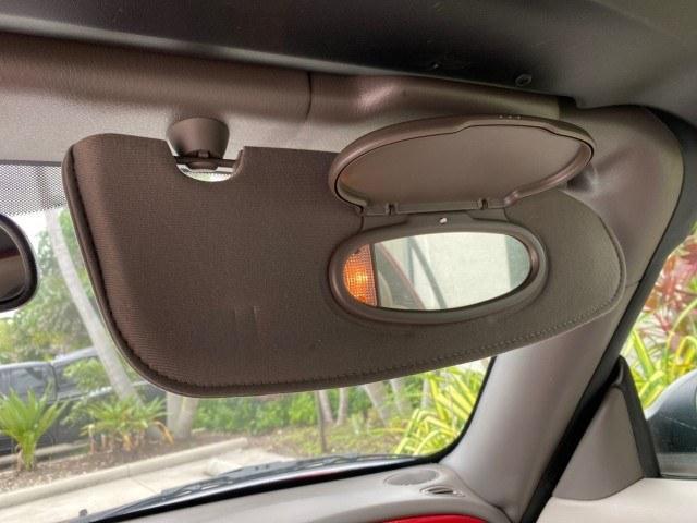 2005 Inferno Red Crystal Pearl /Taupe/Pearl Beige Chrysler PT Cruiser Touring CONV LOW MILES 34,462 (3C3AY55E85T) with an 2.4L DOHC SMPI 16-Valve I4 Engine engine, Automatic transmission, located at 4701 North Dixie Hwy, Pompano Beach, FL, 33064, (954) 422-2889, 26.240938, -80.123474 - OUR WEBPAGE FLORIDACARS1.COM HAS OVER 100 PHOTOS AND FREE CARFAX LINK 2005 Chrysler PT Cruiser Touring Convertible 2.4L I4 F DOHC 16V Gasoline 29 MPG Front Wheel Drive Features ABS Brakes Air Conditioning Alloy Wheels AM/FM Stereo Automatic Transmission Cassette Player CD Audio Cruise Control Leathe- Photo#47