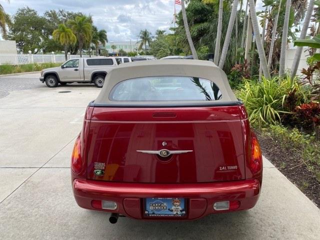 2005 Inferno Red Crystal Pearl /Taupe/Pearl Beige Chrysler PT Cruiser Touring CONV LOW MILES 34,462 (3C3AY55E85T) with an 2.4L DOHC SMPI 16-Valve I4 Engine engine, Automatic transmission, located at 4701 North Dixie Hwy, Pompano Beach, FL, 33064, (954) 422-2889, 26.240938, -80.123474 - OUR WEBPAGE FLORIDACARS1.COM HAS OVER 100 PHOTOS AND FREE CARFAX LINK 2005 Chrysler PT Cruiser Touring Convertible 2.4L I4 F DOHC 16V Gasoline 29 MPG Front Wheel Drive Features ABS Brakes Air Conditioning Alloy Wheels AM/FM Stereo Automatic Transmission Cassette Player CD Audio Cruise Control Leathe- Photo#55