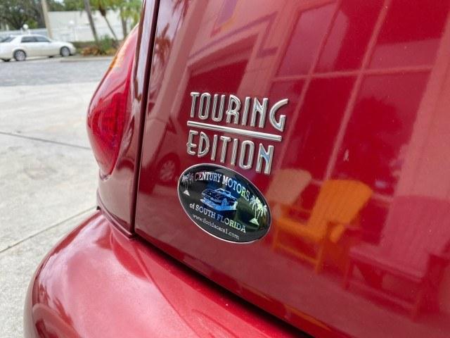 2005 Inferno Red Crystal Pearl /Taupe/Pearl Beige Chrysler PT Cruiser Touring CONV LOW MILES 34,462 (3C3AY55E85T) with an 2.4L DOHC SMPI 16-Valve I4 Engine engine, Automatic transmission, located at 4701 North Dixie Hwy, Pompano Beach, FL, 33064, (954) 422-2889, 26.240938, -80.123474 - OUR WEBPAGE FLORIDACARS1.COM HAS OVER 100 PHOTOS AND FREE CARFAX LINK 2005 Chrysler PT Cruiser Touring Convertible 2.4L I4 F DOHC 16V Gasoline 29 MPG Front Wheel Drive Features ABS Brakes Air Conditioning Alloy Wheels AM/FM Stereo Automatic Transmission Cassette Player CD Audio Cruise Control Leathe- Photo#56