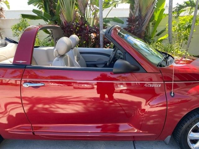 2005 Inferno Red Crystal Pearl /Taupe/Pearl Beige Chrysler PT Cruiser Touring CONV LOW MILES 34,462 (3C3AY55E85T) with an 2.4L DOHC SMPI 16-Valve I4 Engine engine, Automatic transmission, located at 4701 North Dixie Hwy, Pompano Beach, FL, 33064, (954) 422-2889, 26.240938, -80.123474 - OUR WEBPAGE FLORIDACARS1.COM HAS OVER 100 PHOTOS AND FREE CARFAX LINK 2005 Chrysler PT Cruiser Touring Convertible 2.4L I4 F DOHC 16V Gasoline 29 MPG Front Wheel Drive Features ABS Brakes Air Conditioning Alloy Wheels AM/FM Stereo Automatic Transmission Cassette Player CD Audio Cruise Control Leathe- Photo#64