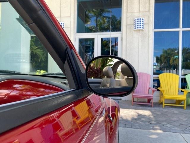 2005 Inferno Red Crystal Pearl /Taupe/Pearl Beige Chrysler PT Cruiser Touring CONV LOW MILES 34,462 (3C3AY55E85T) with an 2.4L DOHC SMPI 16-Valve I4 Engine engine, Automatic transmission, located at 4701 North Dixie Hwy, Pompano Beach, FL, 33064, (954) 422-2889, 26.240938, -80.123474 - OUR WEBPAGE FLORIDACARS1.COM HAS OVER 100 PHOTOS AND FREE CARFAX LINK 2005 Chrysler PT Cruiser Touring Convertible 2.4L I4 F DOHC 16V Gasoline 29 MPG Front Wheel Drive Features ABS Brakes Air Conditioning Alloy Wheels AM/FM Stereo Automatic Transmission Cassette Player CD Audio Cruise Control Leathe- Photo#66
