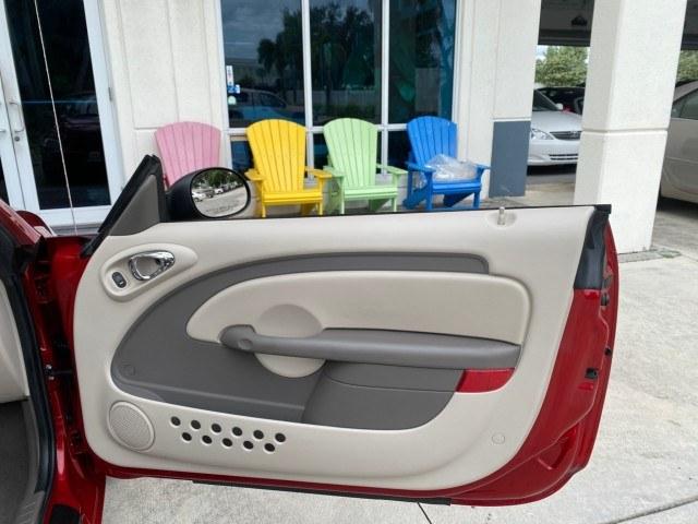 2005 Inferno Red Crystal Pearl /Taupe/Pearl Beige Chrysler PT Cruiser Touring CONV LOW MILES 34,462 (3C3AY55E85T) with an 2.4L DOHC SMPI 16-Valve I4 Engine engine, Automatic transmission, located at 4701 North Dixie Hwy, Pompano Beach, FL, 33064, (954) 422-2889, 26.240938, -80.123474 - OUR WEBPAGE FLORIDACARS1.COM HAS OVER 100 PHOTOS AND FREE CARFAX LINK 2005 Chrysler PT Cruiser Touring Convertible 2.4L I4 F DOHC 16V Gasoline 29 MPG Front Wheel Drive Features ABS Brakes Air Conditioning Alloy Wheels AM/FM Stereo Automatic Transmission Cassette Player CD Audio Cruise Control Leathe- Photo#69