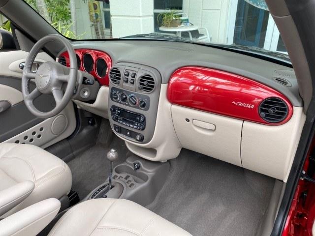 2005 Inferno Red Crystal Pearl /Taupe/Pearl Beige Chrysler PT Cruiser Touring CONV LOW MILES 34,462 (3C3AY55E85T) with an 2.4L DOHC SMPI 16-Valve I4 Engine engine, Automatic transmission, located at 4701 North Dixie Hwy, Pompano Beach, FL, 33064, (954) 422-2889, 26.240938, -80.123474 - OUR WEBPAGE FLORIDACARS1.COM HAS OVER 100 PHOTOS AND FREE CARFAX LINK 2005 Chrysler PT Cruiser Touring Convertible 2.4L I4 F DOHC 16V Gasoline 29 MPG Front Wheel Drive Features ABS Brakes Air Conditioning Alloy Wheels AM/FM Stereo Automatic Transmission Cassette Player CD Audio Cruise Control Leathe- Photo#71