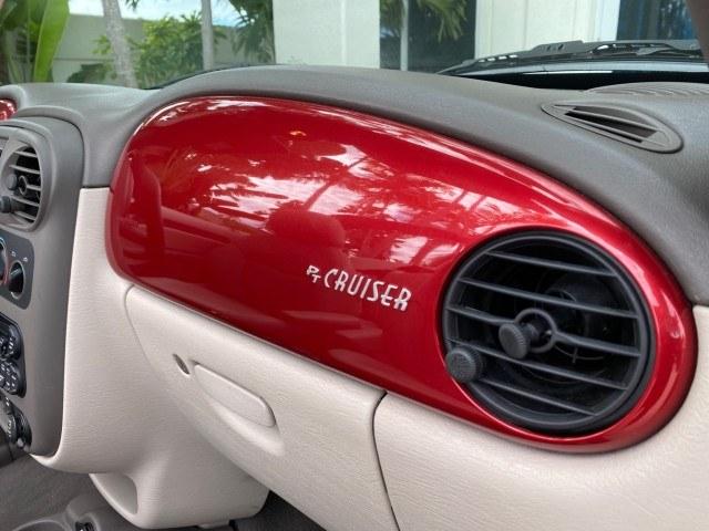 2005 Inferno Red Crystal Pearl /Taupe/Pearl Beige Chrysler PT Cruiser Touring CONV LOW MILES 34,462 (3C3AY55E85T) with an 2.4L DOHC SMPI 16-Valve I4 Engine engine, Automatic transmission, located at 4701 North Dixie Hwy, Pompano Beach, FL, 33064, (954) 422-2889, 26.240938, -80.123474 - OUR WEBPAGE FLORIDACARS1.COM HAS OVER 100 PHOTOS AND FREE CARFAX LINK 2005 Chrysler PT Cruiser Touring Convertible 2.4L I4 F DOHC 16V Gasoline 29 MPG Front Wheel Drive Features ABS Brakes Air Conditioning Alloy Wheels AM/FM Stereo Automatic Transmission Cassette Player CD Audio Cruise Control Leathe- Photo#72