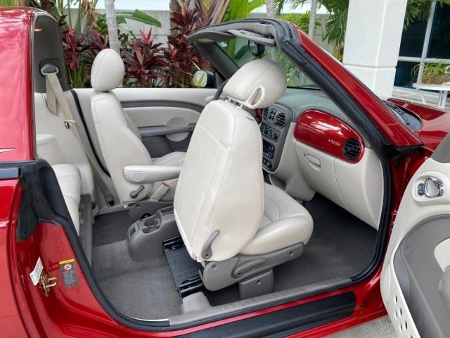 2005 Inferno Red Crystal Pearl /Taupe/Pearl Beige Chrysler PT Cruiser Touring CONV LOW MILES 34,462 (3C3AY55E85T) with an 2.4L DOHC SMPI 16-Valve I4 Engine engine, Automatic transmission, located at 4701 North Dixie Hwy, Pompano Beach, FL, 33064, (954) 422-2889, 26.240938, -80.123474 - OUR WEBPAGE FLORIDACARS1.COM HAS OVER 100 PHOTOS AND FREE CARFAX LINK 2005 Chrysler PT Cruiser Touring Convertible 2.4L I4 F DOHC 16V Gasoline 29 MPG Front Wheel Drive Features ABS Brakes Air Conditioning Alloy Wheels AM/FM Stereo Automatic Transmission Cassette Player CD Audio Cruise Control Leathe- Photo#75