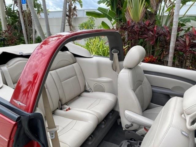 2005 Inferno Red Crystal Pearl /Taupe/Pearl Beige Chrysler PT Cruiser Touring CONV LOW MILES 34,462 (3C3AY55E85T) with an 2.4L DOHC SMPI 16-Valve I4 Engine engine, Automatic transmission, located at 4701 North Dixie Hwy, Pompano Beach, FL, 33064, (954) 422-2889, 26.240938, -80.123474 - OUR WEBPAGE FLORIDACARS1.COM HAS OVER 100 PHOTOS AND FREE CARFAX LINK 2005 Chrysler PT Cruiser Touring Convertible 2.4L I4 F DOHC 16V Gasoline 29 MPG Front Wheel Drive Features ABS Brakes Air Conditioning Alloy Wheels AM/FM Stereo Automatic Transmission Cassette Player CD Audio Cruise Control Leathe- Photo#76