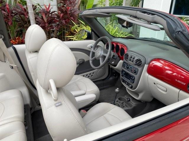 2005 Inferno Red Crystal Pearl /Taupe/Pearl Beige Chrysler PT Cruiser Touring CONV LOW MILES 34,462 (3C3AY55E85T) with an 2.4L DOHC SMPI 16-Valve I4 Engine engine, Automatic transmission, located at 4701 North Dixie Hwy, Pompano Beach, FL, 33064, (954) 422-2889, 26.240938, -80.123474 - OUR WEBPAGE FLORIDACARS1.COM HAS OVER 100 PHOTOS AND FREE CARFAX LINK 2005 Chrysler PT Cruiser Touring Convertible 2.4L I4 F DOHC 16V Gasoline 29 MPG Front Wheel Drive Features ABS Brakes Air Conditioning Alloy Wheels AM/FM Stereo Automatic Transmission Cassette Player CD Audio Cruise Control Leathe- Photo#78