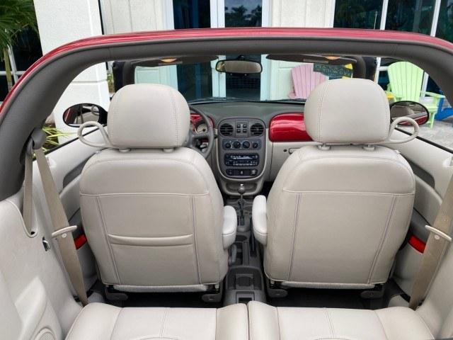 2005 Inferno Red Crystal Pearl /Taupe/Pearl Beige Chrysler PT Cruiser Touring CONV LOW MILES 34,462 (3C3AY55E85T) with an 2.4L DOHC SMPI 16-Valve I4 Engine engine, Automatic transmission, located at 4701 North Dixie Hwy, Pompano Beach, FL, 33064, (954) 422-2889, 26.240938, -80.123474 - OUR WEBPAGE FLORIDACARS1.COM HAS OVER 100 PHOTOS AND FREE CARFAX LINK 2005 Chrysler PT Cruiser Touring Convertible 2.4L I4 F DOHC 16V Gasoline 29 MPG Front Wheel Drive Features ABS Brakes Air Conditioning Alloy Wheels AM/FM Stereo Automatic Transmission Cassette Player CD Audio Cruise Control Leathe- Photo#81