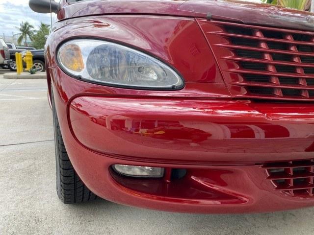 2005 Inferno Red Crystal Pearl /Taupe/Pearl Beige Chrysler PT Cruiser Touring CONV LOW MILES 34,462 (3C3AY55E85T) with an 2.4L DOHC SMPI 16-Valve I4 Engine engine, Automatic transmission, located at 4701 North Dixie Hwy, Pompano Beach, FL, 33064, (954) 422-2889, 26.240938, -80.123474 - OUR WEBPAGE FLORIDACARS1.COM HAS OVER 100 PHOTOS AND FREE CARFAX LINK 2005 Chrysler PT Cruiser Touring Convertible 2.4L I4 F DOHC 16V Gasoline 29 MPG Front Wheel Drive Features ABS Brakes Air Conditioning Alloy Wheels AM/FM Stereo Automatic Transmission Cassette Player CD Audio Cruise Control Leathe- Photo#88