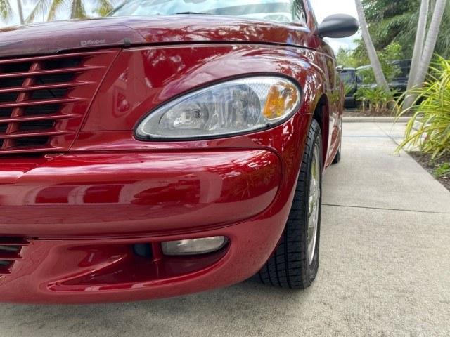 2005 Inferno Red Crystal Pearl /Taupe/Pearl Beige Chrysler PT Cruiser Touring CONV LOW MILES 34,462 (3C3AY55E85T) with an 2.4L DOHC SMPI 16-Valve I4 Engine engine, Automatic transmission, located at 4701 North Dixie Hwy, Pompano Beach, FL, 33064, (954) 422-2889, 26.240938, -80.123474 - OUR WEBPAGE FLORIDACARS1.COM HAS OVER 100 PHOTOS AND FREE CARFAX LINK 2005 Chrysler PT Cruiser Touring Convertible 2.4L I4 F DOHC 16V Gasoline 29 MPG Front Wheel Drive Features ABS Brakes Air Conditioning Alloy Wheels AM/FM Stereo Automatic Transmission Cassette Player CD Audio Cruise Control Leathe- Photo#90