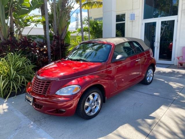 2005 Inferno Red Crystal Pearl /Taupe/Pearl Beige Chrysler PT Cruiser Touring CONV LOW MILES 34,462 (3C3AY55E85T) with an 2.4L DOHC SMPI 16-Valve I4 Engine engine, Automatic transmission, located at 4701 North Dixie Hwy, Pompano Beach, FL, 33064, (954) 422-2889, 26.240938, -80.123474 - OUR WEBPAGE FLORIDACARS1.COM HAS OVER 100 PHOTOS AND FREE CARFAX LINK 2005 Chrysler PT Cruiser Touring Convertible 2.4L I4 F DOHC 16V Gasoline 29 MPG Front Wheel Drive Features ABS Brakes Air Conditioning Alloy Wheels AM/FM Stereo Automatic Transmission Cassette Player CD Audio Cruise Control Leathe- Photo#98