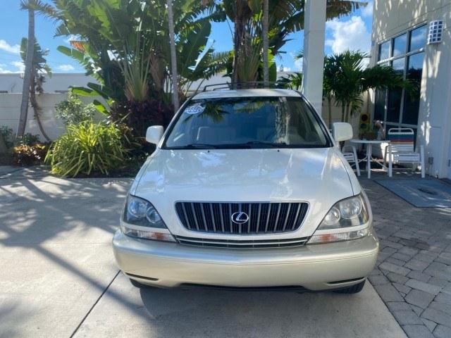 1999 Desert Bronze Metallic /Ivory Lexus RX 300 Luxury SUV LOW MILES 62,417 1 OWNER (JT6GF10U6X0) with an 3.0L Aluminum 24-Valve V6 Engine engine, Automatic transmission, located at 4701 North Dixie Hwy, Pompano Beach, FL, 33064, (954) 422-2889, 26.240938, -80.123474 - OUR WEBPAGE FLORIDACARS1.COM HAS OVER 100 PHOTOS AND FREE CARFAX LINK 1999 Lexus RX 300 1 OWNER 4 Door Wagon/Sport Utility 3.0L V6 F 24V Gasoline 24 MPG Front Wheel Drive Features ABS Brakes Air Conditioning Alloy Wheels AM/FM Stereo Automatic Transmission Cassette Player Cruise Control Full Roof Ra- Photo#2
