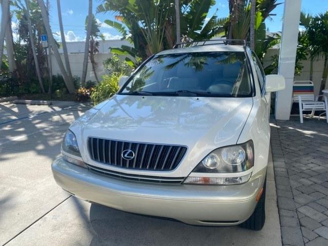1999 Desert Bronze Metallic /Ivory Lexus RX 300 Luxury SUV LOW MILES 62,417 1 OWNER (JT6GF10U6X0) with an 3.0L Aluminum 24-Valve V6 Engine engine, Automatic transmission, located at 4701 North Dixie Hwy, Pompano Beach, FL, 33064, (954) 422-2889, 26.240938, -80.123474 - OUR WEBPAGE FLORIDACARS1.COM HAS OVER 100 PHOTOS AND FREE CARFAX LINK 1999 Lexus RX 300 1 OWNER 4 Door Wagon/Sport Utility 3.0L V6 F 24V Gasoline 24 MPG Front Wheel Drive Features ABS Brakes Air Conditioning Alloy Wheels AM/FM Stereo Automatic Transmission Cassette Player Cruise Control Full Roof Ra- Photo#3