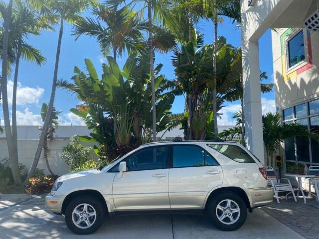 1999 Desert Bronze Metallic /Ivory Lexus RX 300 Luxury SUV LOW MILES 62,417 1 OWNER (JT6GF10U6X0) with an 3.0L Aluminum 24-Valve V6 Engine engine, Automatic transmission, located at 4701 North Dixie Hwy, Pompano Beach, FL, 33064, (954) 422-2889, 26.240938, -80.123474 - OUR WEBPAGE FLORIDACARS1.COM HAS OVER 100 PHOTOS AND FREE CARFAX LINK 1999 Lexus RX 300 1 OWNER 4 Door Wagon/Sport Utility 3.0L V6 F 24V Gasoline 24 MPG Front Wheel Drive Features ABS Brakes Air Conditioning Alloy Wheels AM/FM Stereo Automatic Transmission Cassette Player Cruise Control Full Roof Ra- Photo#4