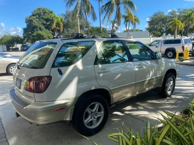 1999 Desert Bronze Metallic /Ivory Lexus RX 300 Luxury SUV LOW MILES 62,417 1 OWNER (JT6GF10U6X0) with an 3.0L Aluminum 24-Valve V6 Engine engine, Automatic transmission, located at 4701 North Dixie Hwy, Pompano Beach, FL, 33064, (954) 422-2889, 26.240938, -80.123474 - OUR WEBPAGE FLORIDACARS1.COM HAS OVER 100 PHOTOS AND FREE CARFAX LINK 1999 Lexus RX 300 1 OWNER 4 Door Wagon/Sport Utility 3.0L V6 F 24V Gasoline 24 MPG Front Wheel Drive Features ABS Brakes Air Conditioning Alloy Wheels AM/FM Stereo Automatic Transmission Cassette Player Cruise Control Full Roof Ra- Photo#7