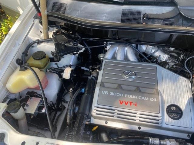 1999 Desert Bronze Metallic /Ivory Lexus RX 300 Luxury SUV LOW MILES 62,417 1 OWNER (JT6GF10U6X0) with an 3.0L Aluminum 24-Valve V6 Engine engine, Automatic transmission, located at 4701 North Dixie Hwy, Pompano Beach, FL, 33064, (954) 422-2889, 26.240938, -80.123474 - OUR WEBPAGE FLORIDACARS1.COM HAS OVER 100 PHOTOS AND FREE CARFAX LINK 1999 Lexus RX 300 1 OWNER 4 Door Wagon/Sport Utility 3.0L V6 F 24V Gasoline 24 MPG Front Wheel Drive Features ABS Brakes Air Conditioning Alloy Wheels AM/FM Stereo Automatic Transmission Cassette Player Cruise Control Full Roof Ra- Photo#24