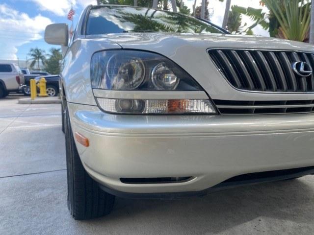 1999 Desert Bronze Metallic /Ivory Lexus RX 300 Luxury SUV LOW MILES 62,417 1 OWNER (JT6GF10U6X0) with an 3.0L Aluminum 24-Valve V6 Engine engine, Automatic transmission, located at 4701 North Dixie Hwy, Pompano Beach, FL, 33064, (954) 422-2889, 26.240938, -80.123474 - OUR WEBPAGE FLORIDACARS1.COM HAS OVER 100 PHOTOS AND FREE CARFAX LINK 1999 Lexus RX 300 1 OWNER 4 Door Wagon/Sport Utility 3.0L V6 F 24V Gasoline 24 MPG Front Wheel Drive Features ABS Brakes Air Conditioning Alloy Wheels AM/FM Stereo Automatic Transmission Cassette Player Cruise Control Full Roof Ra- Photo#93