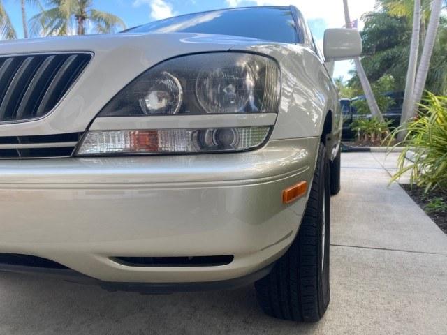 1999 Desert Bronze Metallic /Ivory Lexus RX 300 Luxury SUV LOW MILES 62,417 1 OWNER (JT6GF10U6X0) with an 3.0L Aluminum 24-Valve V6 Engine engine, Automatic transmission, located at 4701 North Dixie Hwy, Pompano Beach, FL, 33064, (954) 422-2889, 26.240938, -80.123474 - OUR WEBPAGE FLORIDACARS1.COM HAS OVER 100 PHOTOS AND FREE CARFAX LINK 1999 Lexus RX 300 1 OWNER 4 Door Wagon/Sport Utility 3.0L V6 F 24V Gasoline 24 MPG Front Wheel Drive Features ABS Brakes Air Conditioning Alloy Wheels AM/FM Stereo Automatic Transmission Cassette Player Cruise Control Full Roof Ra- Photo#94