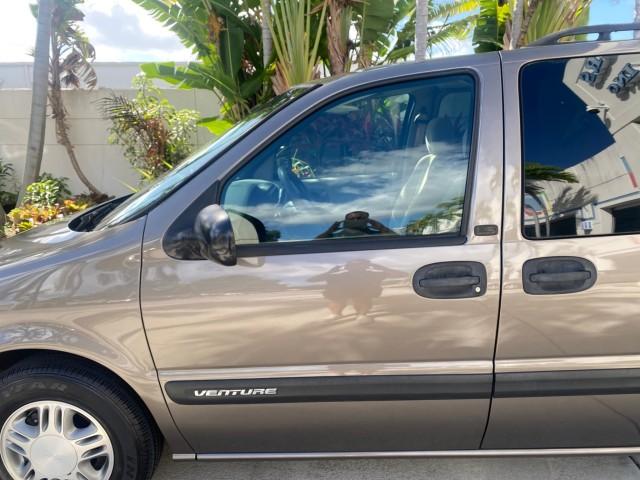 2005 Bronzemist Metallic /Neutral Chevrolet Venture LS LOW MILES 48,285 (1GNDV23E45D) with an 3.4L 3400 V6 SFI Engine engine, Automatic transmission, located at 4701 North Dixie Hwy, Pompano Beach, FL, 33064, (954) 422-2889, 26.240938, -80.123474 - OUR WEBPAGE FLORIDACARS1.COM HAS OVER 100 PHOTOS AND FREE CARFAX LINK 2005 Chevrolet Venture LS Van 3.4L V6 F Gasoline 26 MPG Front Wheel Drive Features ABS Brakes Air Conditioning Alloy Wheels AM/FM Stereo Automatic Transmission CD Audio Cloth Seats Cruise Control Parking Sensors Power Locks Roof R- Photo#27