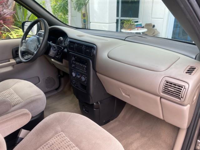 2005 Bronzemist Metallic /Neutral Chevrolet Venture LS LOW MILES 48,285 (1GNDV23E45D) with an 3.4L 3400 V6 SFI Engine engine, Automatic transmission, located at 4701 North Dixie Hwy, Pompano Beach, FL, 33064, (954) 422-2889, 26.240938, -80.123474 - OUR WEBPAGE FLORIDACARS1.COM HAS OVER 100 PHOTOS AND FREE CARFAX LINK 2005 Chevrolet Venture LS Van 3.4L V6 F Gasoline 26 MPG Front Wheel Drive Features ABS Brakes Air Conditioning Alloy Wheels AM/FM Stereo Automatic Transmission CD Audio Cloth Seats Cruise Control Parking Sensors Power Locks Roof R- Photo#85