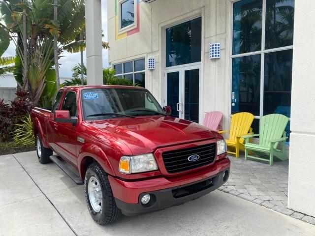 2008 Redfire Metallic /Medium Dk Flint Ford Ranger Sport LOW MILES 51,759 X CAB LOADED (1FTYR14U28P) with an 3.0L OHV V6 Engine engine, Automatic transmission, located at 4701 North Dixie Hwy, Pompano Beach, FL, 33064, (954) 422-2889, 26.240938, -80.123474 - OUR WEBPAGE FLORIDACARS1.COM HAS OVER 100 PHOTOS AND FREE CARFAX LINK 2008 Ford Ranger Sport Club Cab Pickup 3.0L V6 F Gasoline 20 MPG Rear Wheel Drive Features ABS Brakes Air Conditioning Alloy Wheels AM/FM Stereo Automatic Transmission Auxiliary Audio Input Bed Liner CD Audio Cloth Seats Power Loc- Photo#1