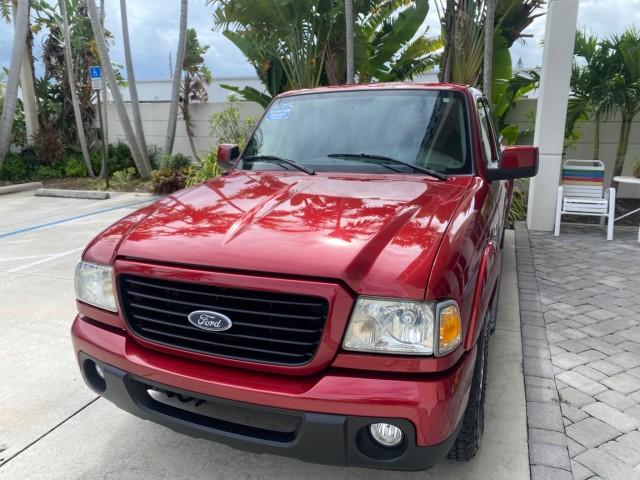 2008 Redfire Metallic /Medium Dk Flint Ford Ranger Sport LOW MILES 51,759 X CAB LOADED (1FTYR14U28P) with an 3.0L OHV V6 Engine engine, Automatic transmission, located at 4701 North Dixie Hwy, Pompano Beach, FL, 33064, (954) 422-2889, 26.240938, -80.123474 - OUR WEBPAGE FLORIDACARS1.COM HAS OVER 100 PHOTOS AND FREE CARFAX LINK 2008 Ford Ranger Sport Club Cab Pickup 3.0L V6 F Gasoline 20 MPG Rear Wheel Drive Features ABS Brakes Air Conditioning Alloy Wheels AM/FM Stereo Automatic Transmission Auxiliary Audio Input Bed Liner CD Audio Cloth Seats Power Loc- Photo#3