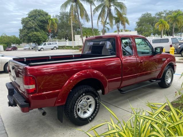2008 Redfire Metallic /Medium Dk Flint Ford Ranger Sport LOW MILES 51,759 X CAB LOADED (1FTYR14U28P) with an 3.0L OHV V6 Engine engine, Automatic transmission, located at 4701 North Dixie Hwy, Pompano Beach, FL, 33064, (954) 422-2889, 26.240938, -80.123474 - OUR WEBPAGE FLORIDACARS1.COM HAS OVER 100 PHOTOS AND FREE CARFAX LINK 2008 Ford Ranger Sport Club Cab Pickup 3.0L V6 F Gasoline 20 MPG Rear Wheel Drive Features ABS Brakes Air Conditioning Alloy Wheels AM/FM Stereo Automatic Transmission Auxiliary Audio Input Bed Liner CD Audio Cloth Seats Power Loc- Photo#7