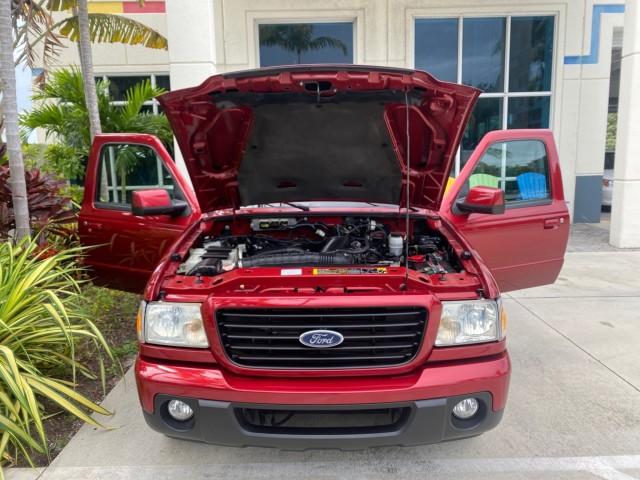 2008 Redfire Metallic /Medium Dk Flint Ford Ranger Sport LOW MILES 51,759 X CAB LOADED (1FTYR14U28P) with an 3.0L OHV V6 Engine engine, Automatic transmission, located at 4701 North Dixie Hwy, Pompano Beach, FL, 33064, (954) 422-2889, 26.240938, -80.123474 - OUR WEBPAGE FLORIDACARS1.COM HAS OVER 100 PHOTOS AND FREE CARFAX LINK 2008 Ford Ranger Sport Club Cab Pickup 3.0L V6 F Gasoline 20 MPG Rear Wheel Drive Features ABS Brakes Air Conditioning Alloy Wheels AM/FM Stereo Automatic Transmission Auxiliary Audio Input Bed Liner CD Audio Cloth Seats Power Loc- Photo#17