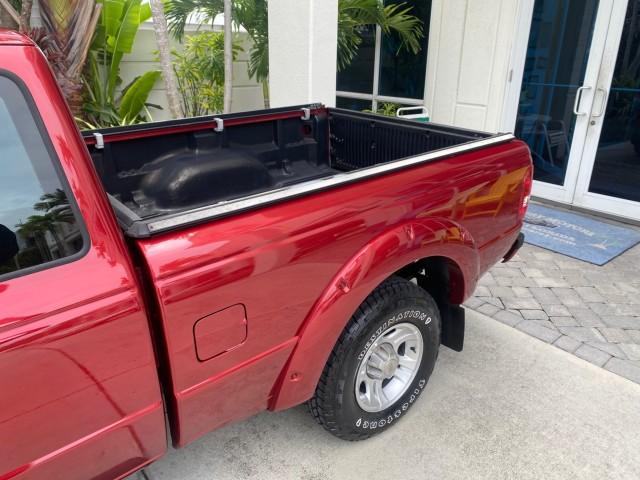 2008 Redfire Metallic /Medium Dk Flint Ford Ranger Sport LOW MILES 51,759 X CAB LOADED (1FTYR14U28P) with an 3.0L OHV V6 Engine engine, Automatic transmission, located at 4701 North Dixie Hwy, Pompano Beach, FL, 33064, (954) 422-2889, 26.240938, -80.123474 - OUR WEBPAGE FLORIDACARS1.COM HAS OVER 100 PHOTOS AND FREE CARFAX LINK 2008 Ford Ranger Sport Club Cab Pickup 3.0L V6 F Gasoline 20 MPG Rear Wheel Drive Features ABS Brakes Air Conditioning Alloy Wheels AM/FM Stereo Automatic Transmission Auxiliary Audio Input Bed Liner CD Audio Cloth Seats Power Loc- Photo#52