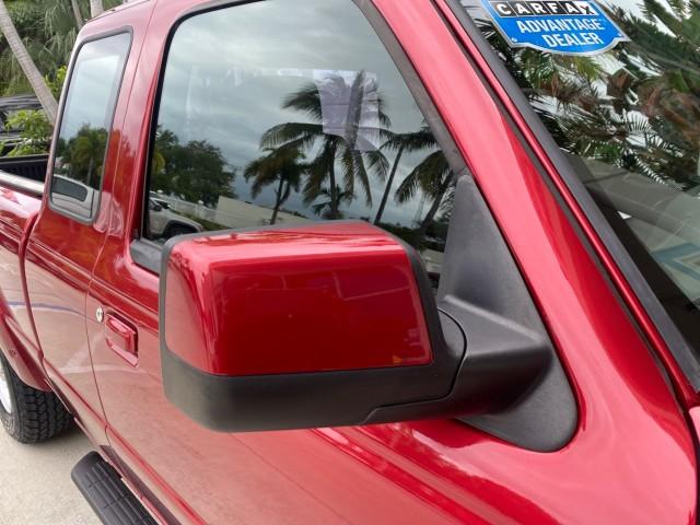 2008 Redfire Metallic /Medium Dk Flint Ford Ranger Sport LOW MILES 51,759 X CAB LOADED (1FTYR14U28P) with an 3.0L OHV V6 Engine engine, Automatic transmission, located at 4701 North Dixie Hwy, Pompano Beach, FL, 33064, (954) 422-2889, 26.240938, -80.123474 - OUR WEBPAGE FLORIDACARS1.COM HAS OVER 100 PHOTOS AND FREE CARFAX LINK 2008 Ford Ranger Sport Club Cab Pickup 3.0L V6 F Gasoline 20 MPG Rear Wheel Drive Features ABS Brakes Air Conditioning Alloy Wheels AM/FM Stereo Automatic Transmission Auxiliary Audio Input Bed Liner CD Audio Cloth Seats Power Loc- Photo#77