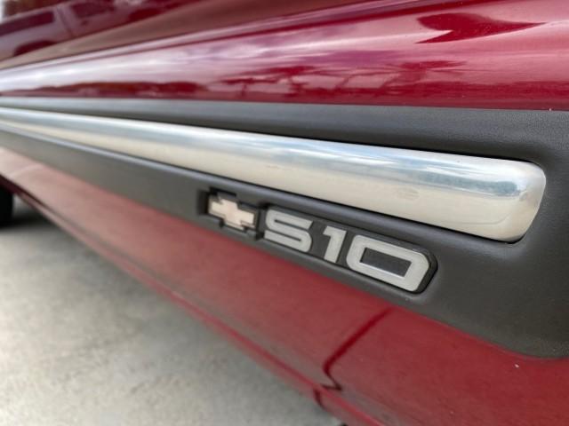 2000 Dark Cherry Red Metallic /Medium Gray Chevrolet S-10 LS LOW MILES 74,811 X CAB (1GCCS1956Y8) with an 2.2L Vortec 1000 SFI Gas/ethanol Flex-Fuel L4 Engine engine, Automatic transmission, located at 4701 North Dixie Hwy, Pompano Beach, FL, 33064, (954) 422-2889, 26.240938, -80.123474 - OUR WEBPAGE FLORIDACARS1.COM HAS OVER 100 PHOTOS AND FREE CARFAX LINK 2000 Chevrolet S-10 Club Cab Pickup 2.2L I4 F Flex Fuel 29 MPG Rear Wheel Drive Features ABS Brakes Air Conditioning Alloy Wheels AM/FM Stereo Automatic Transmission CD Audio Cloth Seats Cruise Control 2000 Chevrolet S-10 Extended- Photo#77