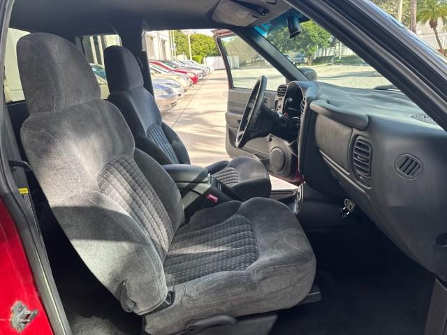 2000 Dark Cherry Red Metallic /Medium Gray Chevrolet S-10 LS LOW MILES 74,811 X CAB (1GCCS1956Y8) with an 2.2L Vortec 1000 SFI Gas/ethanol Flex-Fuel L4 Engine engine, Automatic transmission, located at 4701 North Dixie Hwy, Pompano Beach, FL, 33064, (954) 422-2889, 26.240938, -80.123474 - OUR WEBPAGE FLORIDACARS1.COM HAS OVER 100 PHOTOS AND FREE CARFAX LINK 2000 Chevrolet S-10 Club Cab Pickup 2.2L I4 F Flex Fuel 29 MPG Rear Wheel Drive Features ABS Brakes Air Conditioning Alloy Wheels AM/FM Stereo Automatic Transmission CD Audio Cloth Seats Cruise Control 2000 Chevrolet S-10 Extended- Photo#12