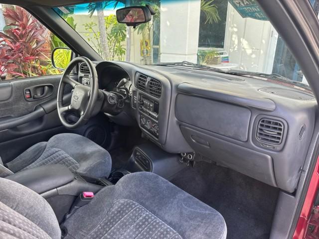 2000 Dark Cherry Red Metallic /Medium Gray Chevrolet S-10 LS LOW MILES 74,811 X CAB (1GCCS1956Y8) with an 2.2L Vortec 1000 SFI Gas/ethanol Flex-Fuel L4 Engine engine, Automatic transmission, located at 4701 North Dixie Hwy, Pompano Beach, FL, 33064, (954) 422-2889, 26.240938, -80.123474 - OUR WEBPAGE FLORIDACARS1.COM HAS OVER 100 PHOTOS AND FREE CARFAX LINK 2000 Chevrolet S-10 Club Cab Pickup 2.2L I4 F Flex Fuel 29 MPG Rear Wheel Drive Features ABS Brakes Air Conditioning Alloy Wheels AM/FM Stereo Automatic Transmission CD Audio Cloth Seats Cruise Control 2000 Chevrolet S-10 Extended- Photo#80