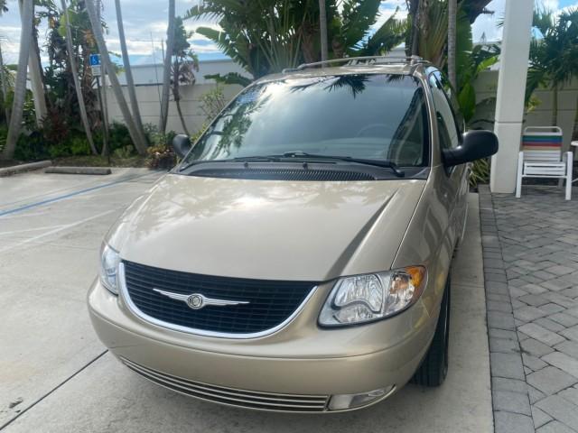 2002 Light Almond Pearl Metallic /Taupe Chrysler Town and Country Limited LOW MILES 54,870 (2C8GP64L92R) with an 3.8L SMPI V6 Engine engine, Automatic transmission, located at 4701 North Dixie Hwy, Pompano Beach, FL, 33064, (954) 422-2889, 26.240938, -80.123474 - OUR WEBPAGE FLORIDACARS1.COM HAS OVER 100 PHOTOS AND FREE CARFAX LINK 2002 Chrysler Town AND Country Limited Van 3.8L V6 F OHV 12V Gasoline 24 MPG Front Wheel Drive Features ABS Brakes Air Conditioning Alloy Wheels AM/FM Stereo Automatic Transmission CD Audio Cruise Control Full Roof Rack Leather Se- Photo#3