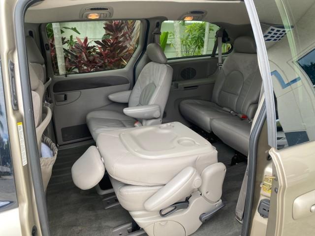 2002 Light Almond Pearl Metallic /Taupe Chrysler Town and Country Limited LOW MILES 54,870 (2C8GP64L92R) with an 3.8L SMPI V6 Engine engine, Automatic transmission, located at 4701 North Dixie Hwy, Pompano Beach, FL, 33064, (954) 422-2889, 26.240938, -80.123474 - OUR WEBPAGE FLORIDACARS1.COM HAS OVER 100 PHOTOS AND FREE CARFAX LINK 2002 Chrysler Town AND Country Limited Van 3.8L V6 F OHV 12V Gasoline 24 MPG Front Wheel Drive Features ABS Brakes Air Conditioning Alloy Wheels AM/FM Stereo Automatic Transmission CD Audio Cruise Control Full Roof Rack Leather Se- Photo#56