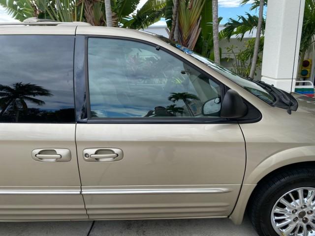 2002 Light Almond Pearl Metallic /Taupe Chrysler Town and Country Limited LOW MILES 54,870 (2C8GP64L92R) with an 3.8L SMPI V6 Engine engine, Automatic transmission, located at 4701 North Dixie Hwy, Pompano Beach, FL, 33064, (954) 422-2889, 26.240938, -80.123474 - OUR WEBPAGE FLORIDACARS1.COM HAS OVER 100 PHOTOS AND FREE CARFAX LINK 2002 Chrysler Town AND Country Limited Van 3.8L V6 F OHV 12V Gasoline 24 MPG Front Wheel Drive Features ABS Brakes Air Conditioning Alloy Wheels AM/FM Stereo Automatic Transmission CD Audio Cruise Control Full Roof Rack Leather Se- Photo#75