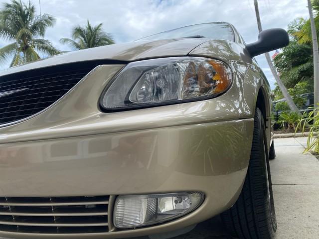 2002 Light Almond Pearl Metallic /Taupe Chrysler Town and Country Limited LOW MILES 54,870 (2C8GP64L92R) with an 3.8L SMPI V6 Engine engine, Automatic transmission, located at 4701 North Dixie Hwy, Pompano Beach, FL, 33064, (954) 422-2889, 26.240938, -80.123474 - OUR WEBPAGE FLORIDACARS1.COM HAS OVER 100 PHOTOS AND FREE CARFAX LINK 2002 Chrysler Town AND Country Limited Van 3.8L V6 F OHV 12V Gasoline 24 MPG Front Wheel Drive Features ABS Brakes Air Conditioning Alloy Wheels AM/FM Stereo Automatic Transmission CD Audio Cruise Control Full Roof Rack Leather Se- Photo#94